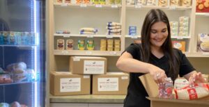 Meredith Bechac, registered dietician, inside the Therapeutic Food Pantry at Mary Bird Perkins Cancer Center in Covington